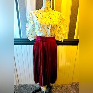 Tops and pleated skirt